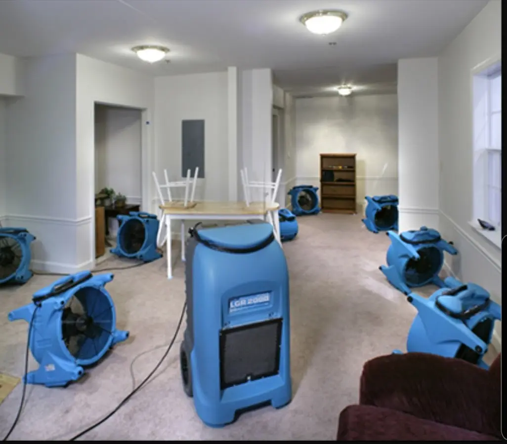 Air movers and dehumidifier setup for Water Extraction & Removal in Marshall